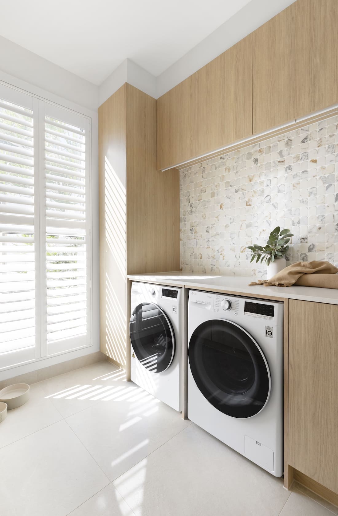 Timber and white laundry with statement splashback