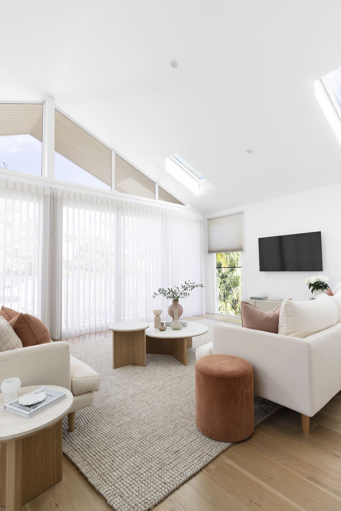 Upstairs living room with statement window