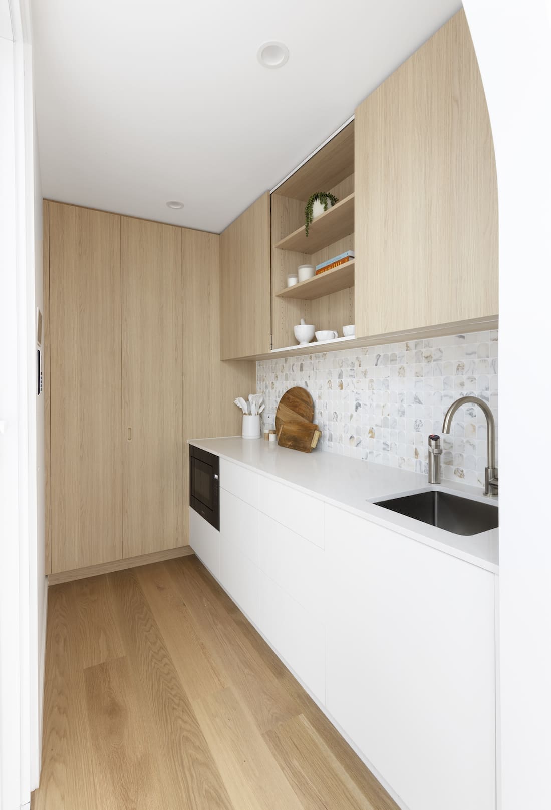 Walk in pantry with timber accents