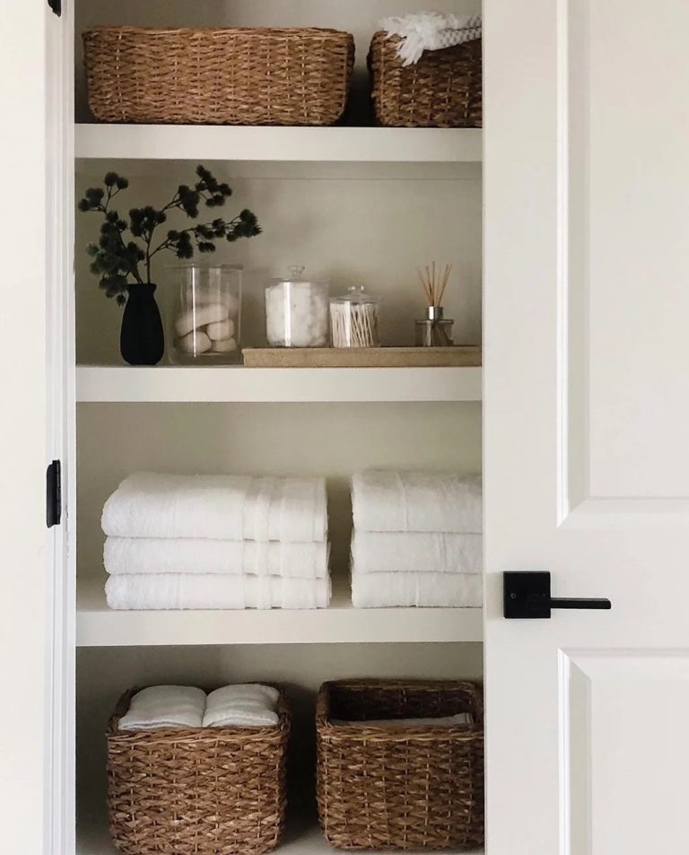 Use baskets to organise your linen closet