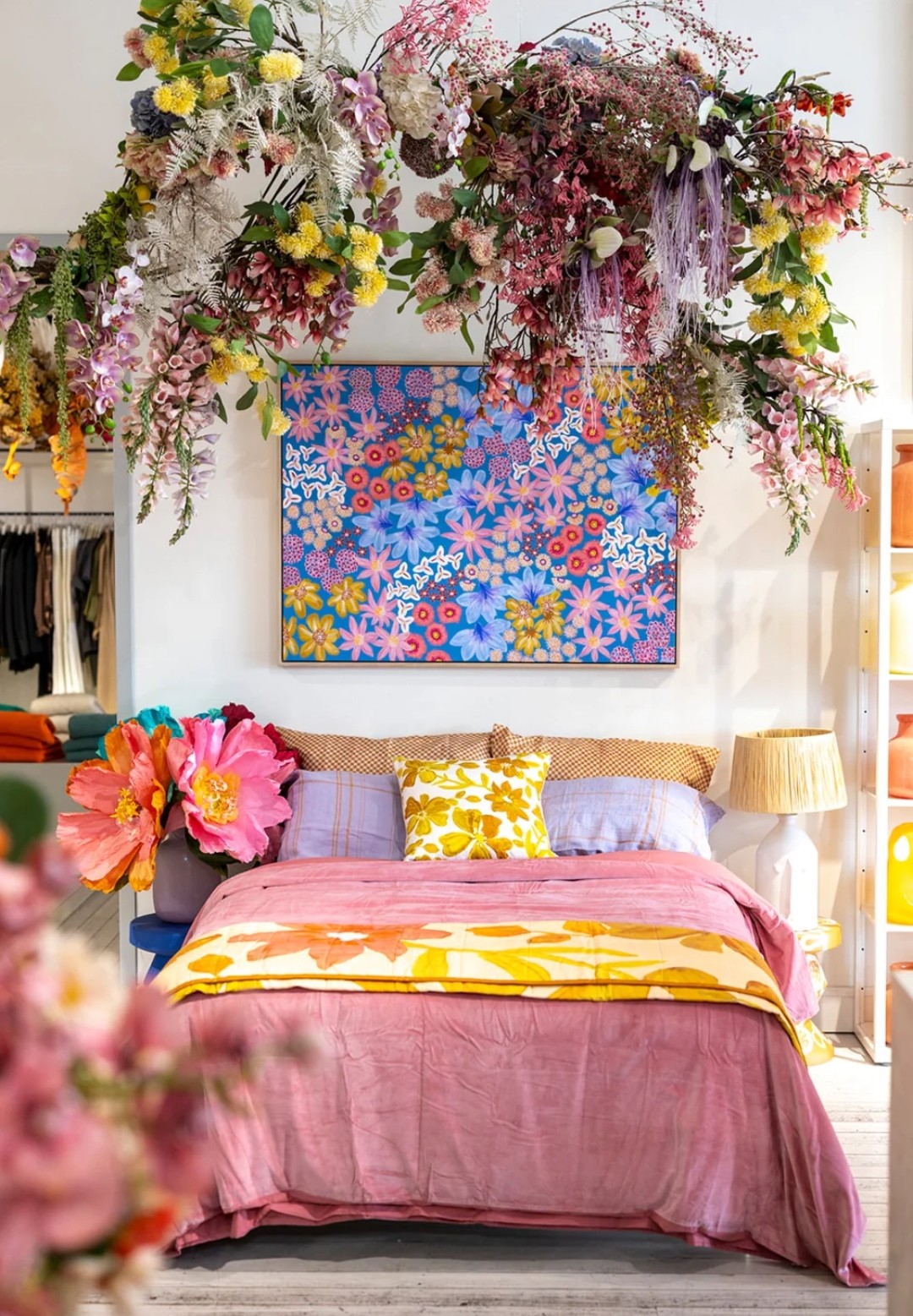 Floral artwork in colourful bedroom from Amy Gibbs