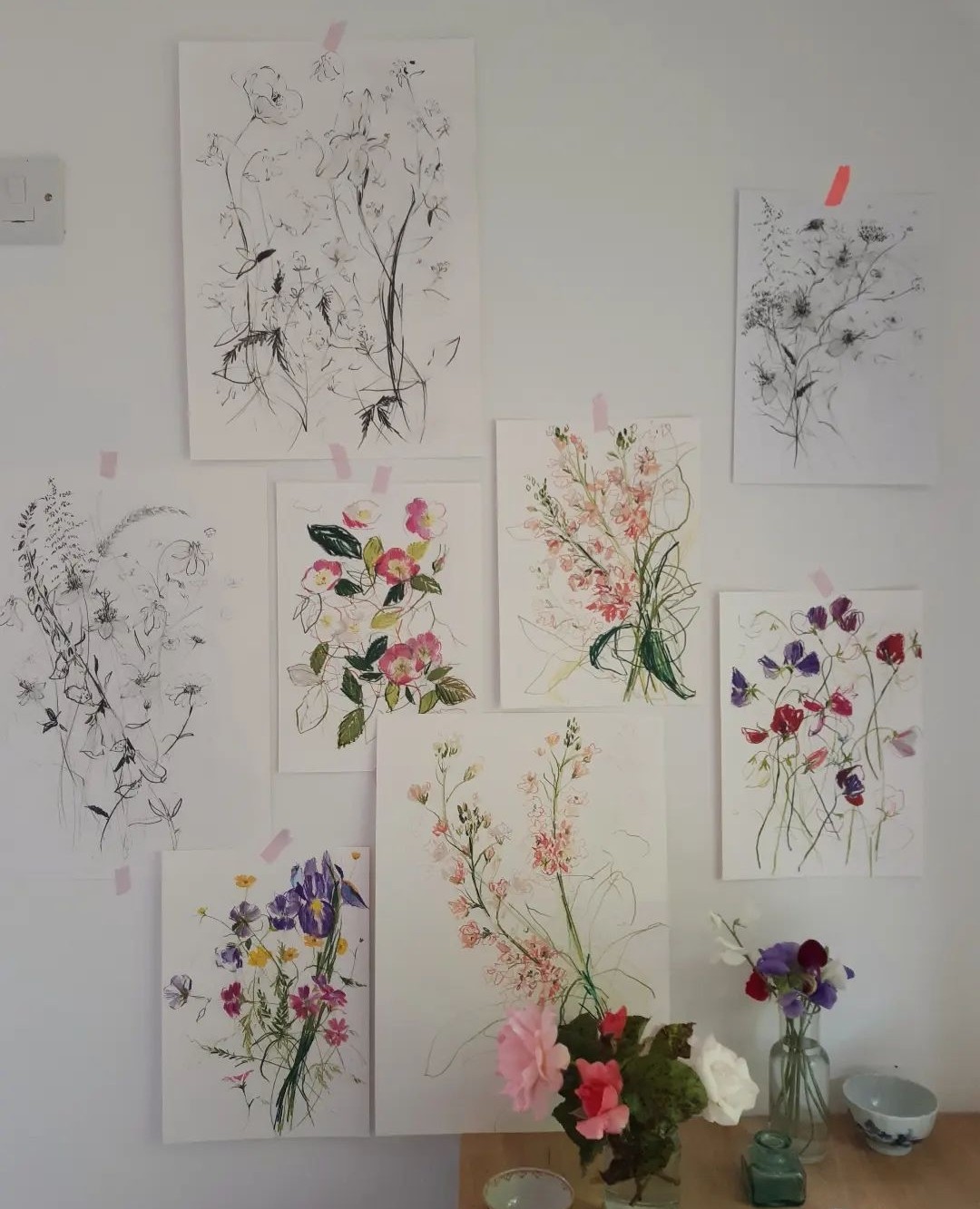 illustrations on studio wall by Claudia Lowry