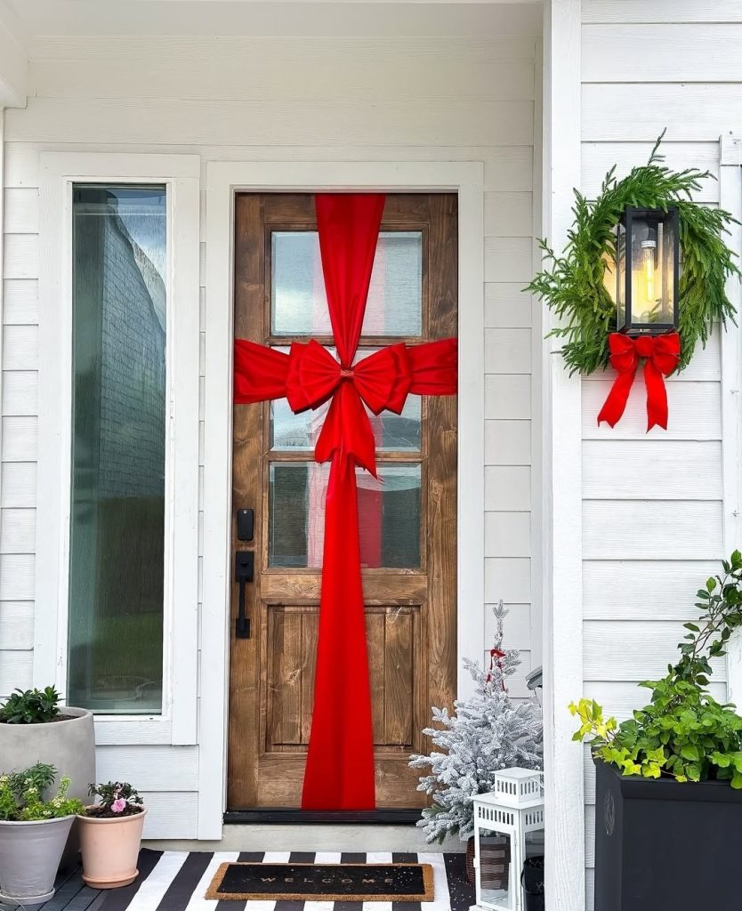 Red bow on front door for Christmas