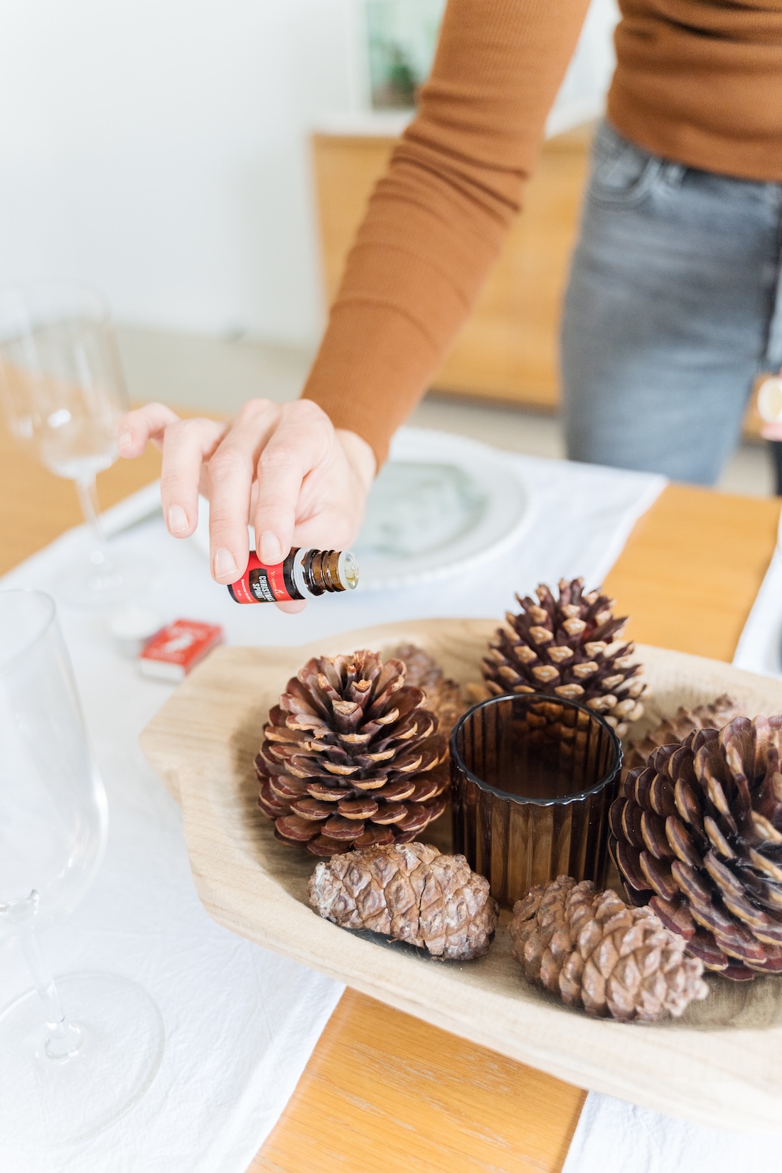 Make your home smell like Christmas with this scented pinecone centrepiece