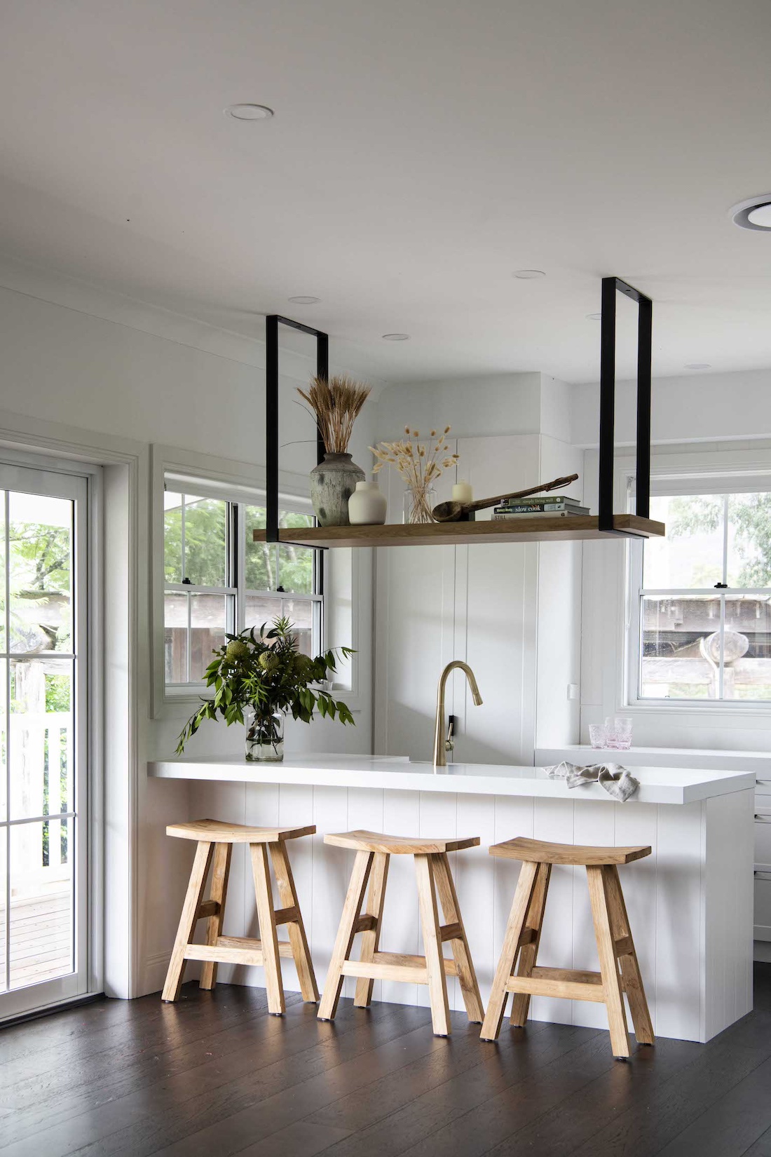 Kitchen with hanging shelf