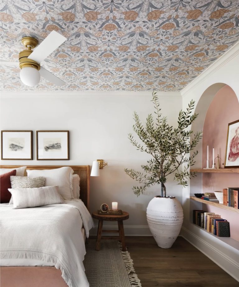 Wallpapered ceiling in bedroom