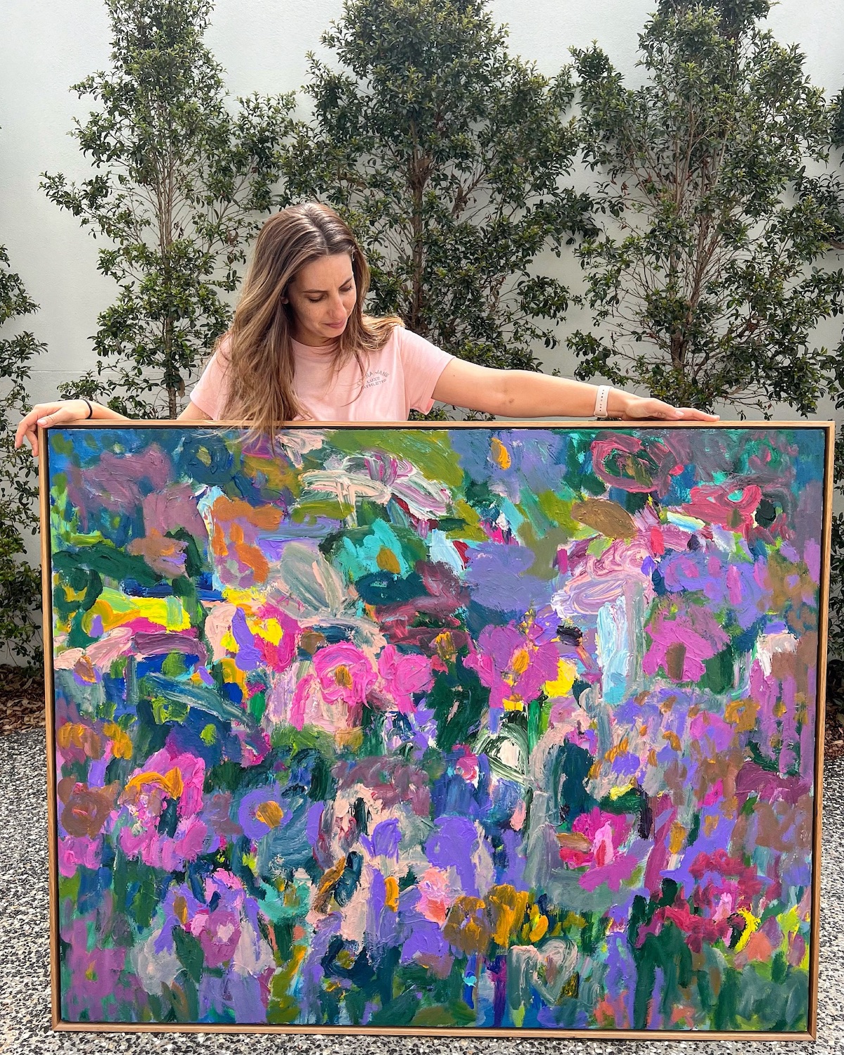 Adele Bevacqua with large floral field artwork