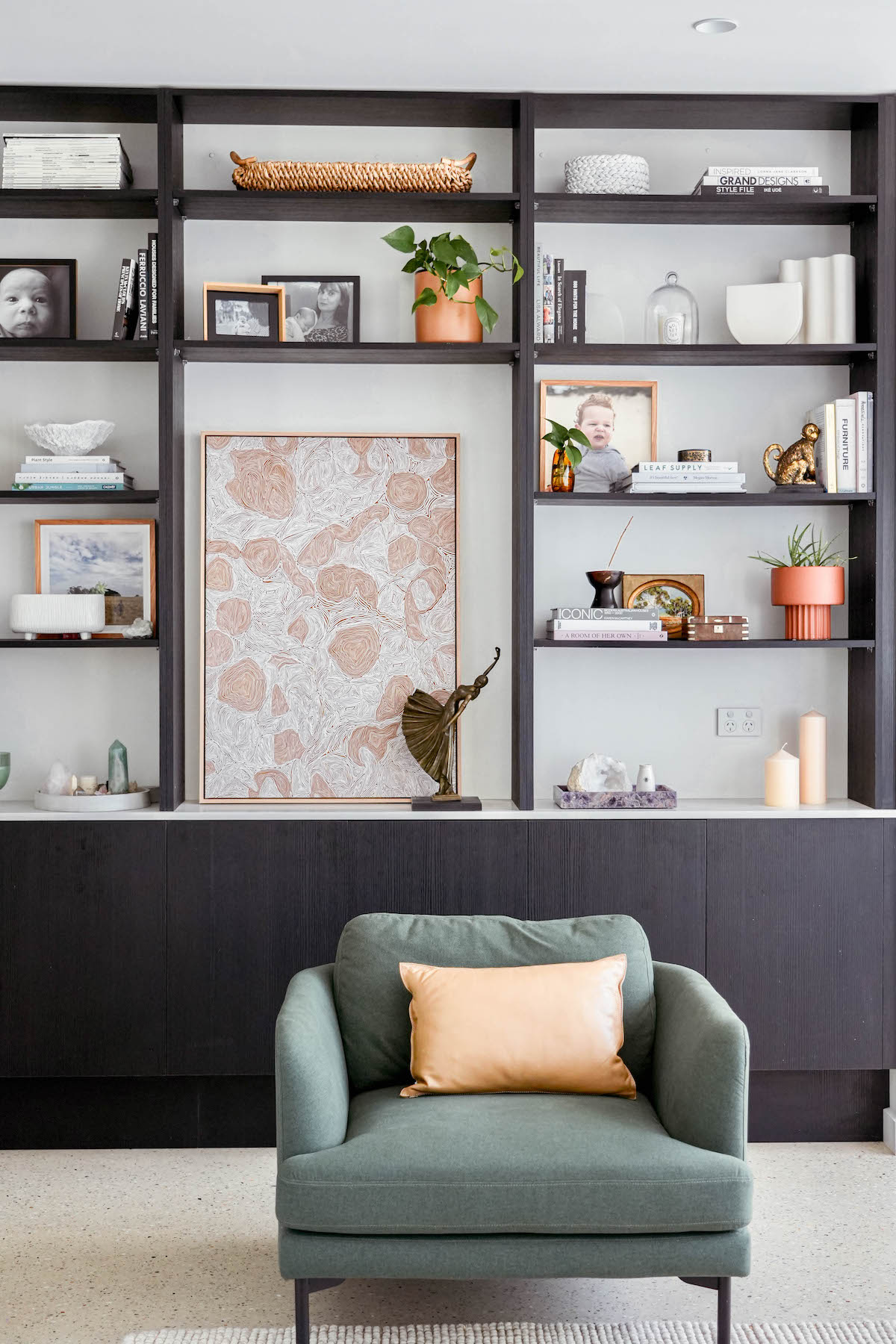 Styling a modern bookshelf with eclectic decor mix vintage decor into a modern home