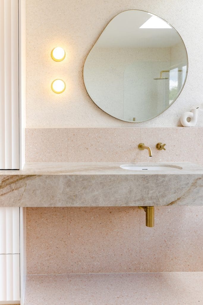 House of Harvee bathroom renovation - quartz vanity and organic mirror