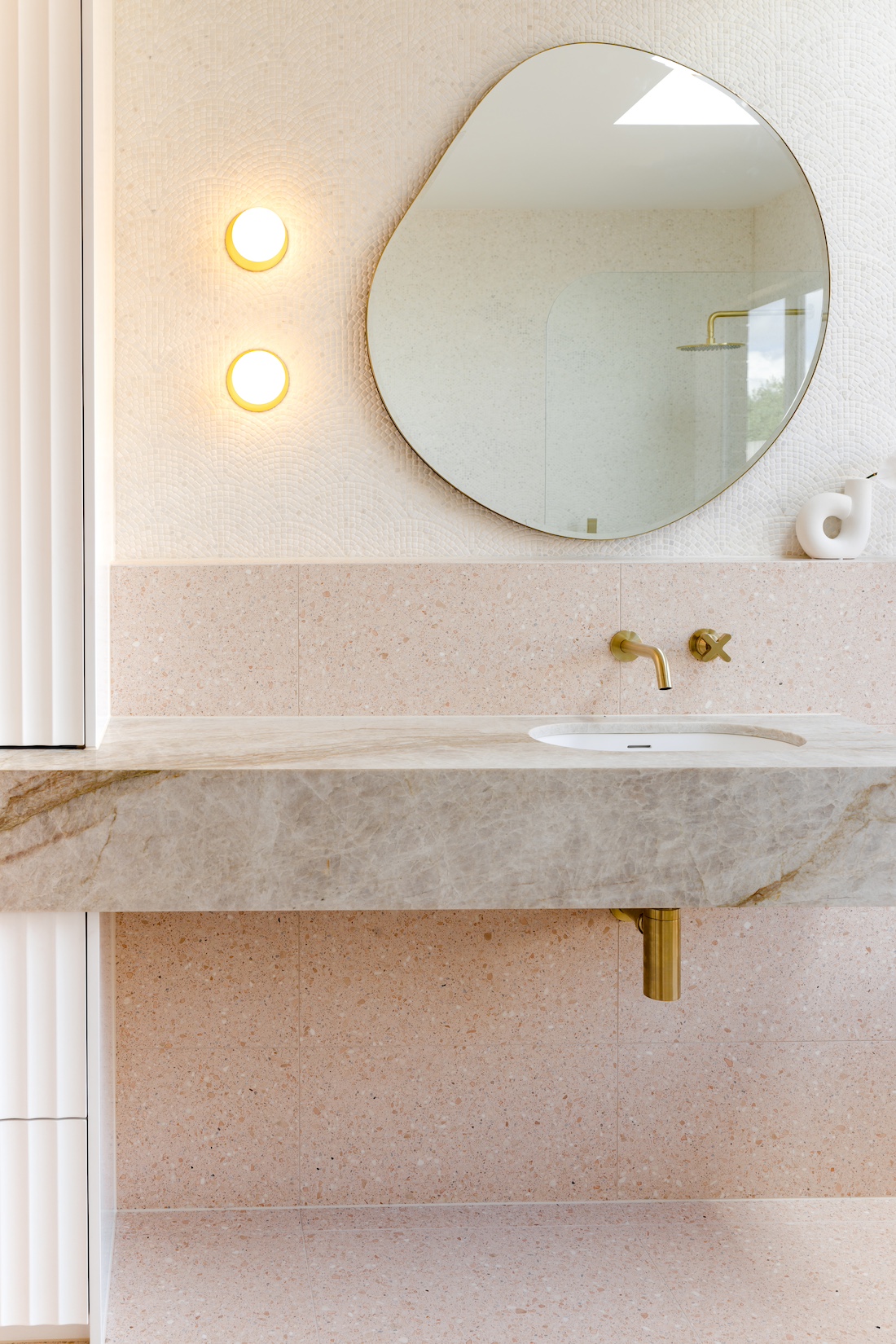 House of Harvee bathroom renovation - quartz vanity and organic mirror