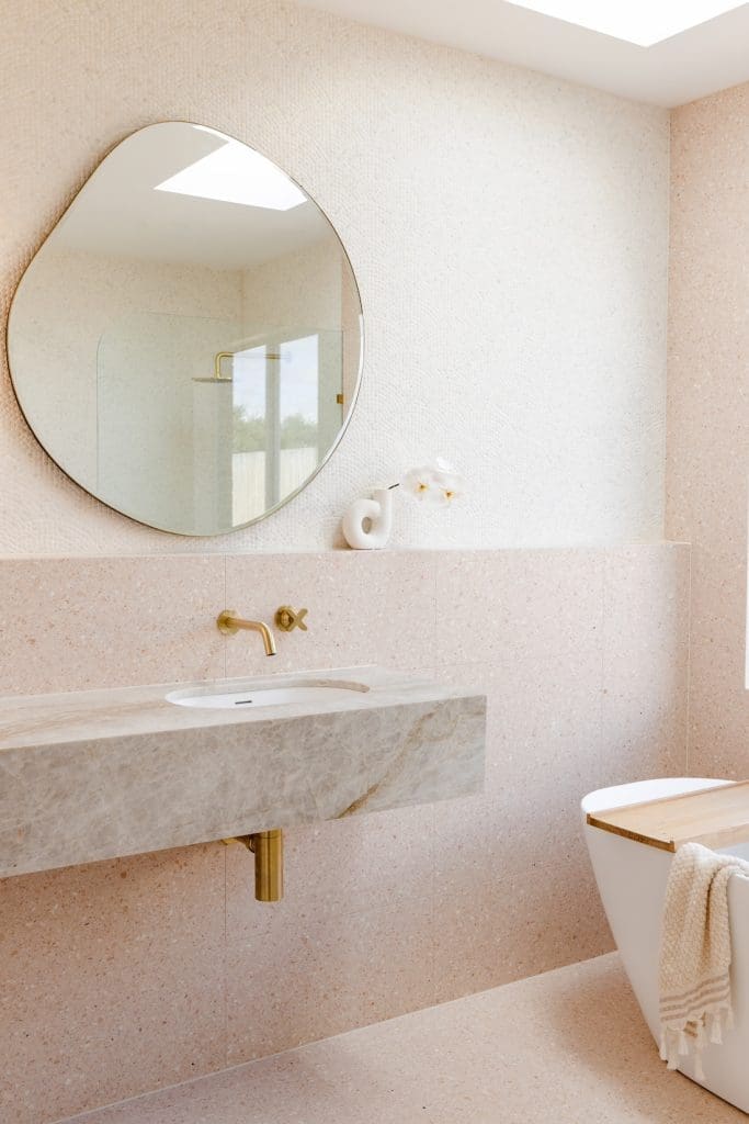 Undermount bathroom basin in solid stone floating vanity
