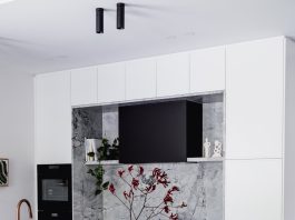 Black batten curved island bench in kitchen at Wattle Valley Road by Picchio Interiors