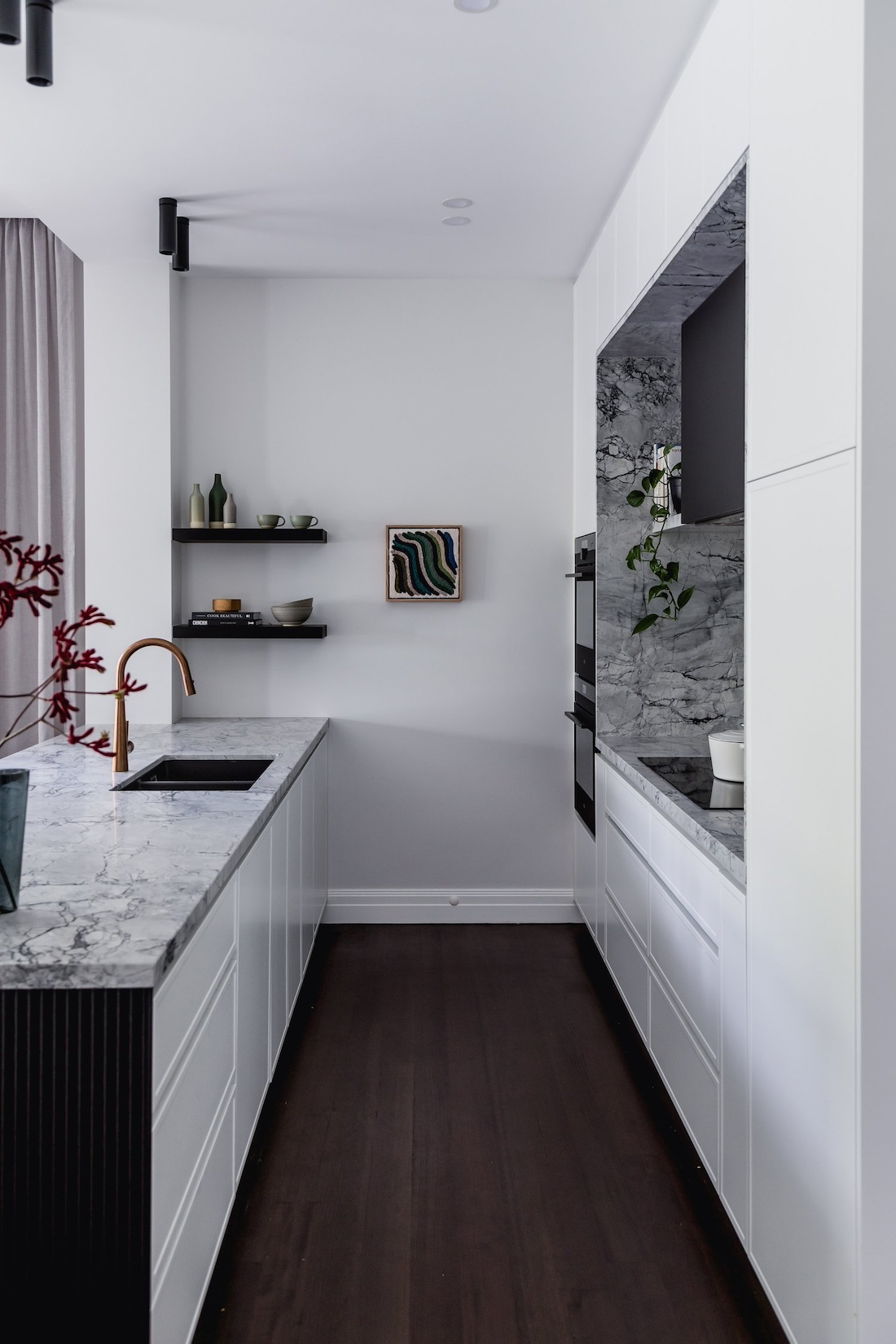 Galley style monochrome kitchen in Wattle Valley Road by Picchio Interiors