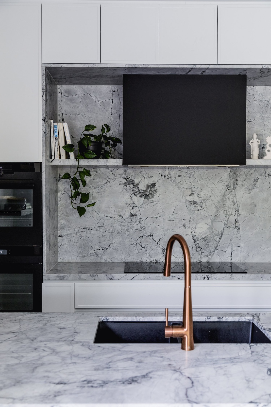 Marble backsplash in kitchen of Wattle Valley Road by Picchio Interiors