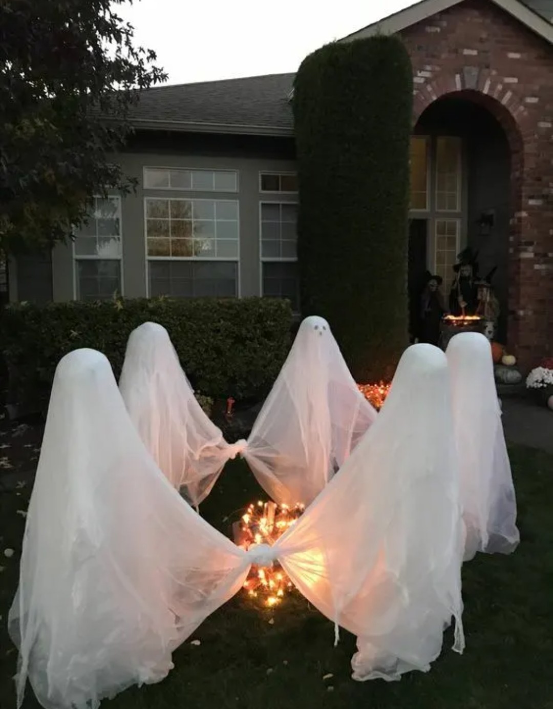 Group of ghosts holding hands