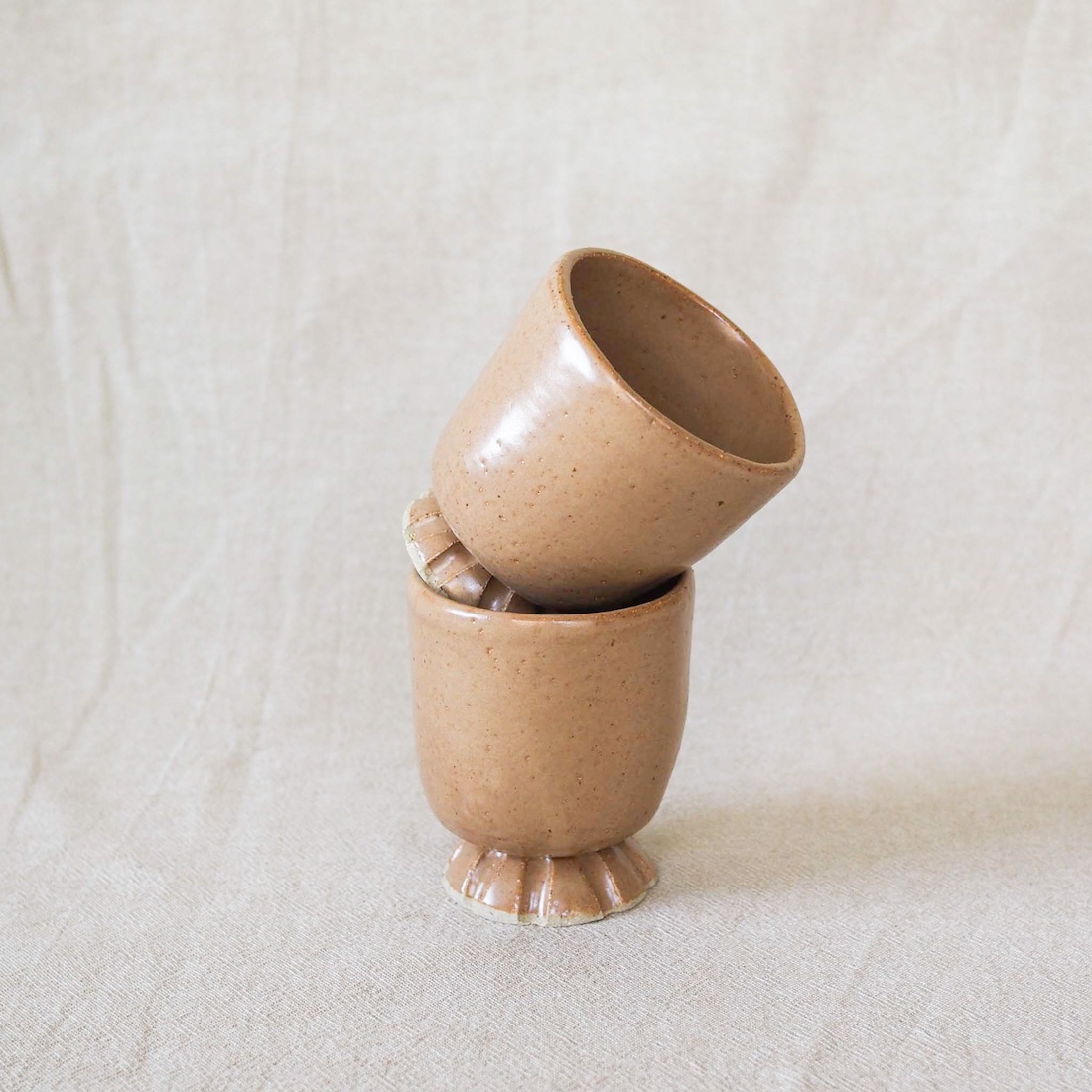 2 brown handmade cups by Ochre Ceramics