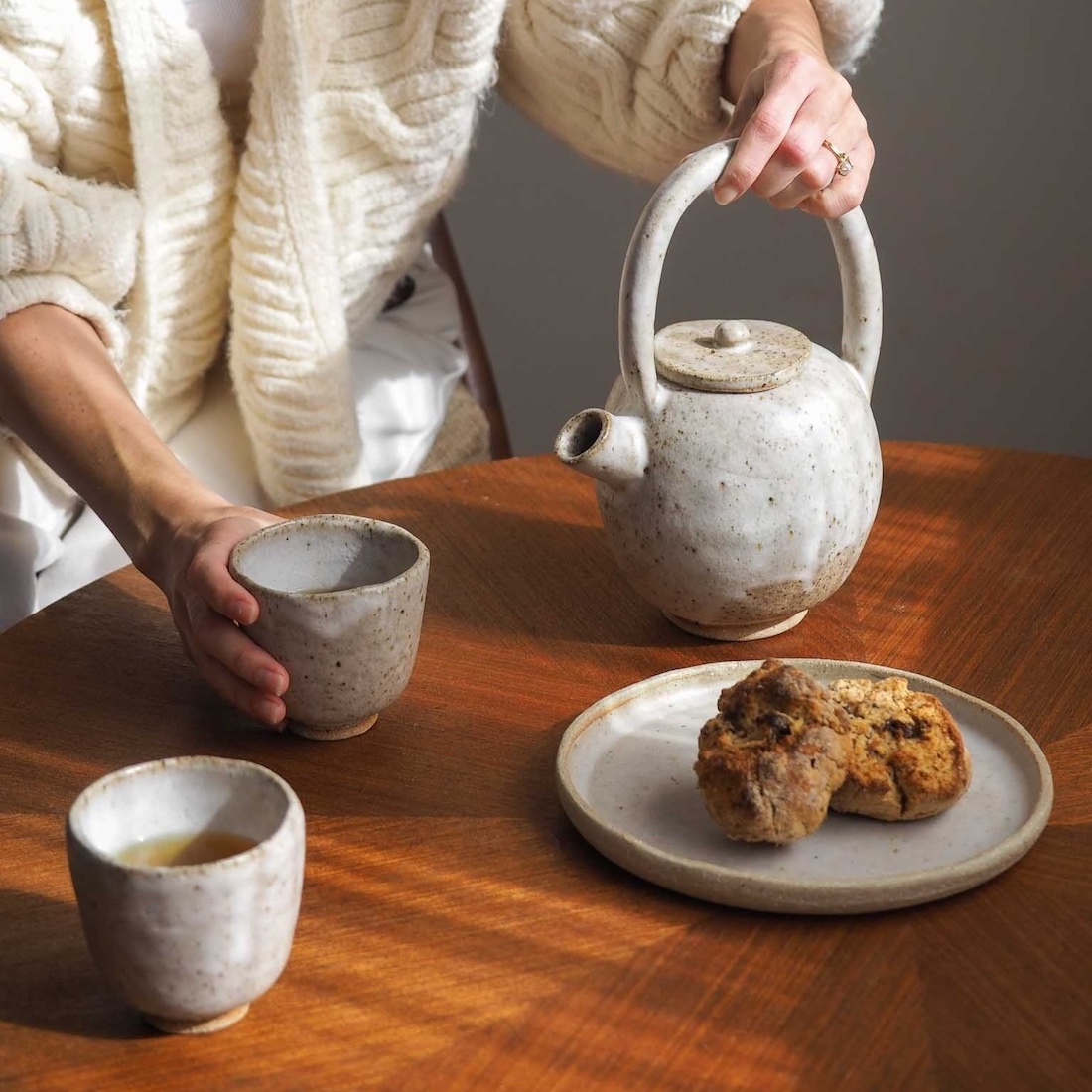 Tea pot, cups and plate handmade by Ochre Ceramics