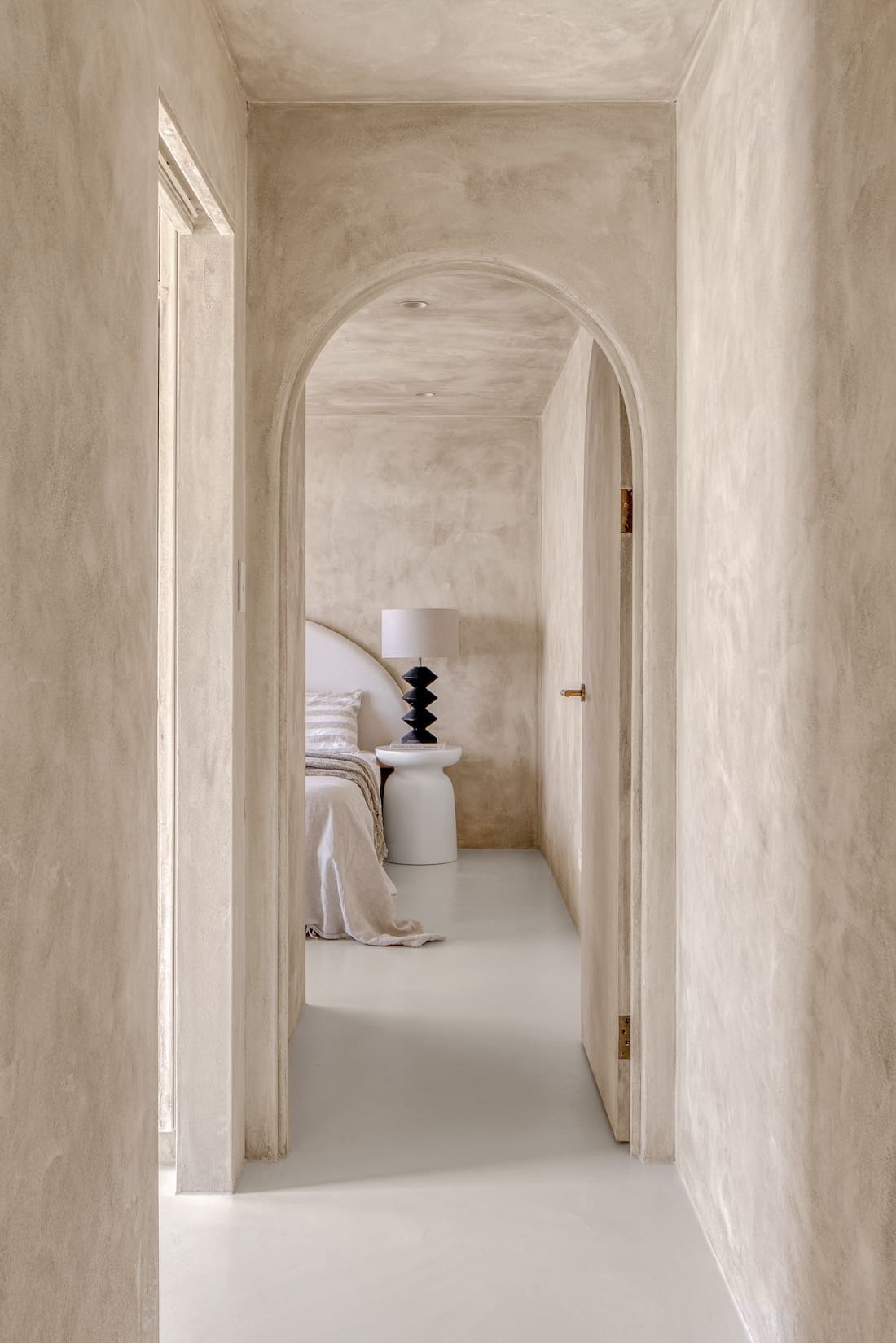 Hallway with colour drenched palette in Ruin X House