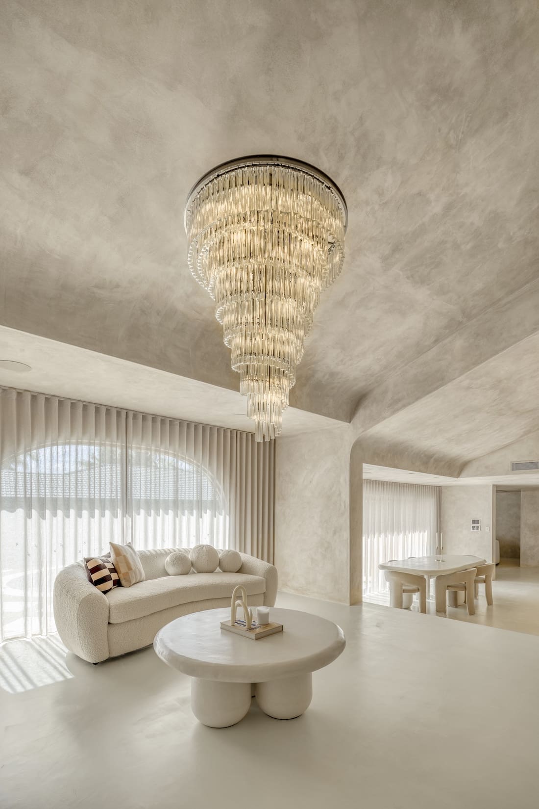 Chandelier in living room at Ruin X house