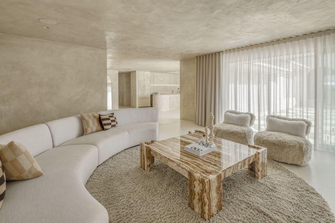 Neutral coloured living room in Ruin X house