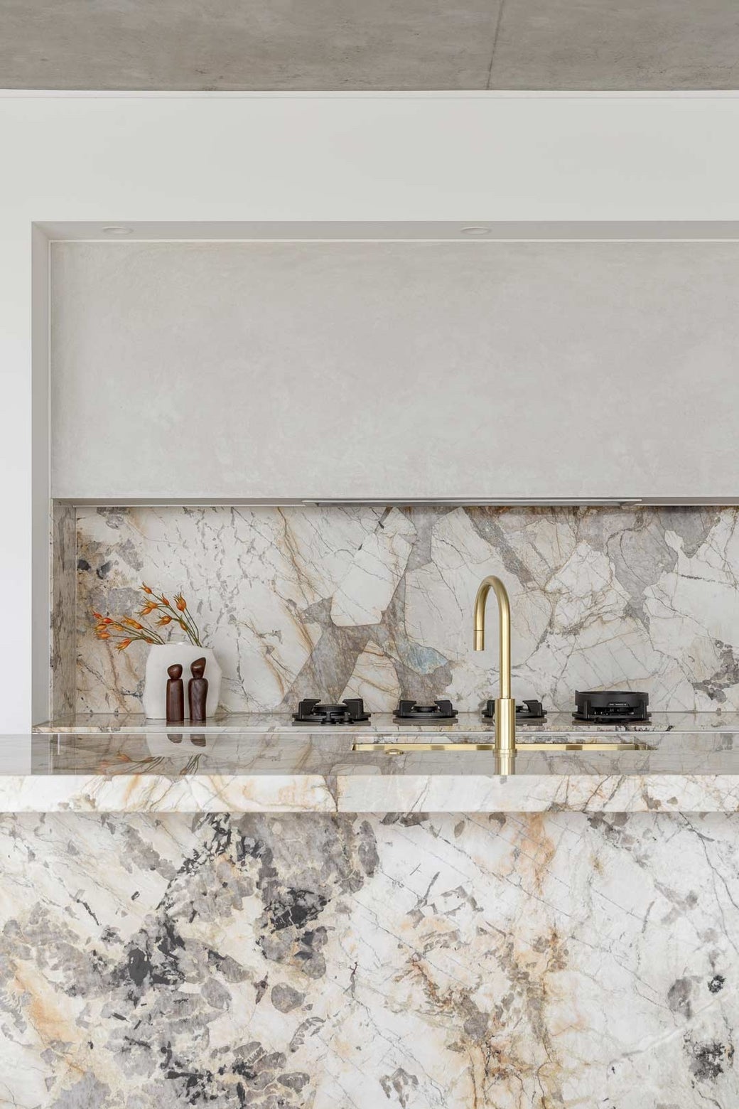 Stone and brass kitchen