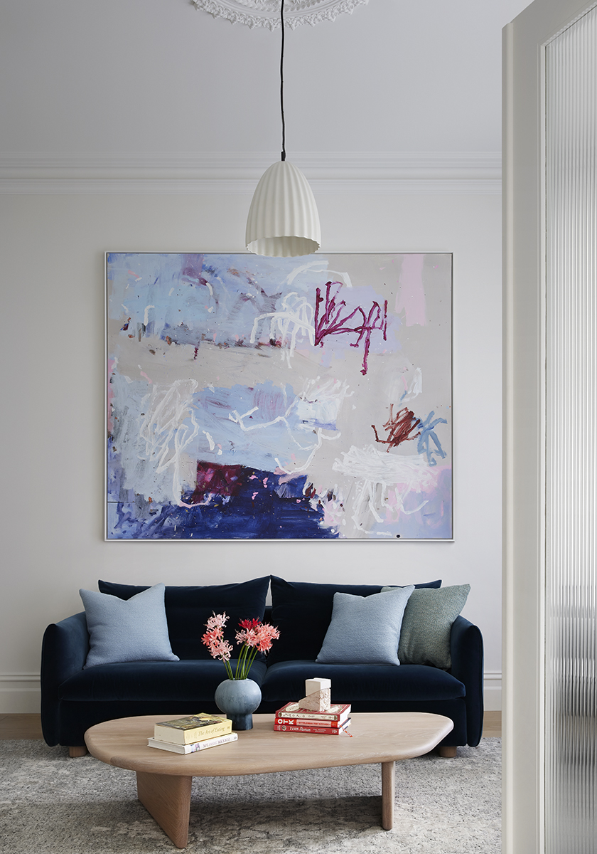 Colourful abstract art in living room of Elsternwick House