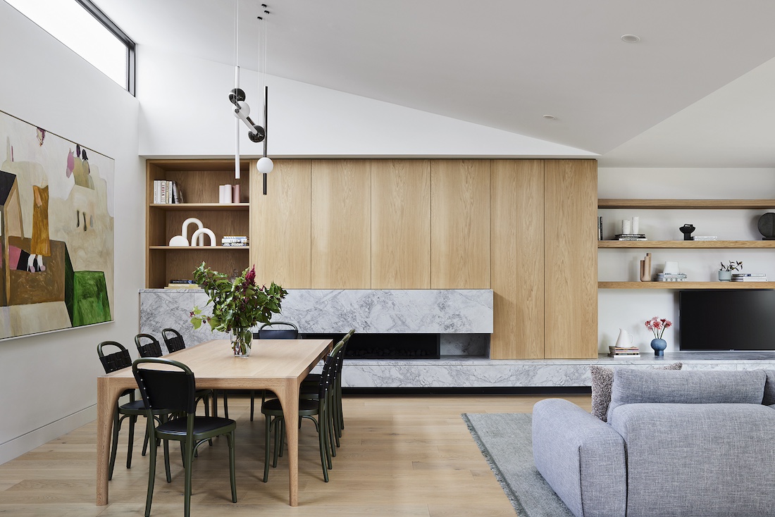 Timber wall in living room with grey marble plinth