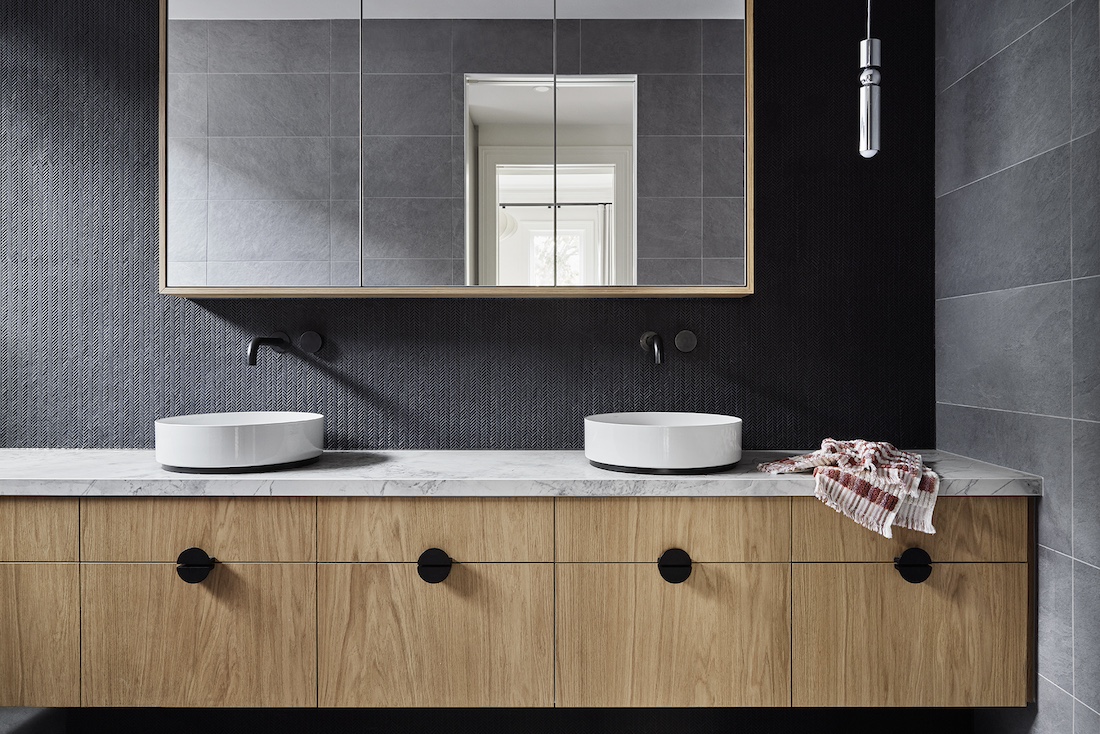 Timber vanity with double basins in bathroom