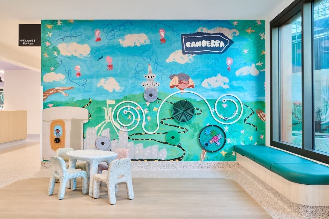 Large scale wall art in Canberra Hospital painted by Musonga Mbogo