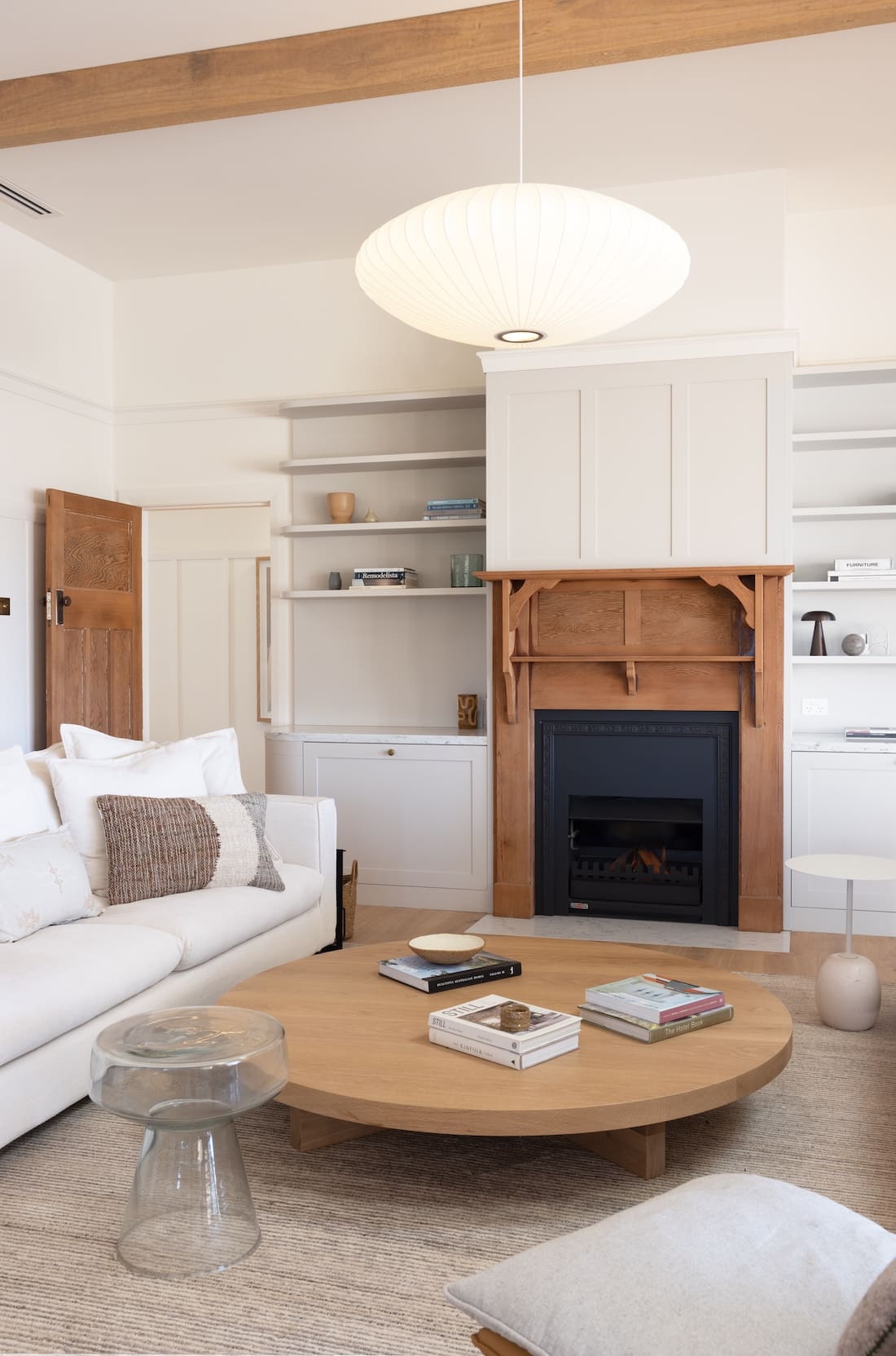 Timber fireplace in living room at Rocklee House