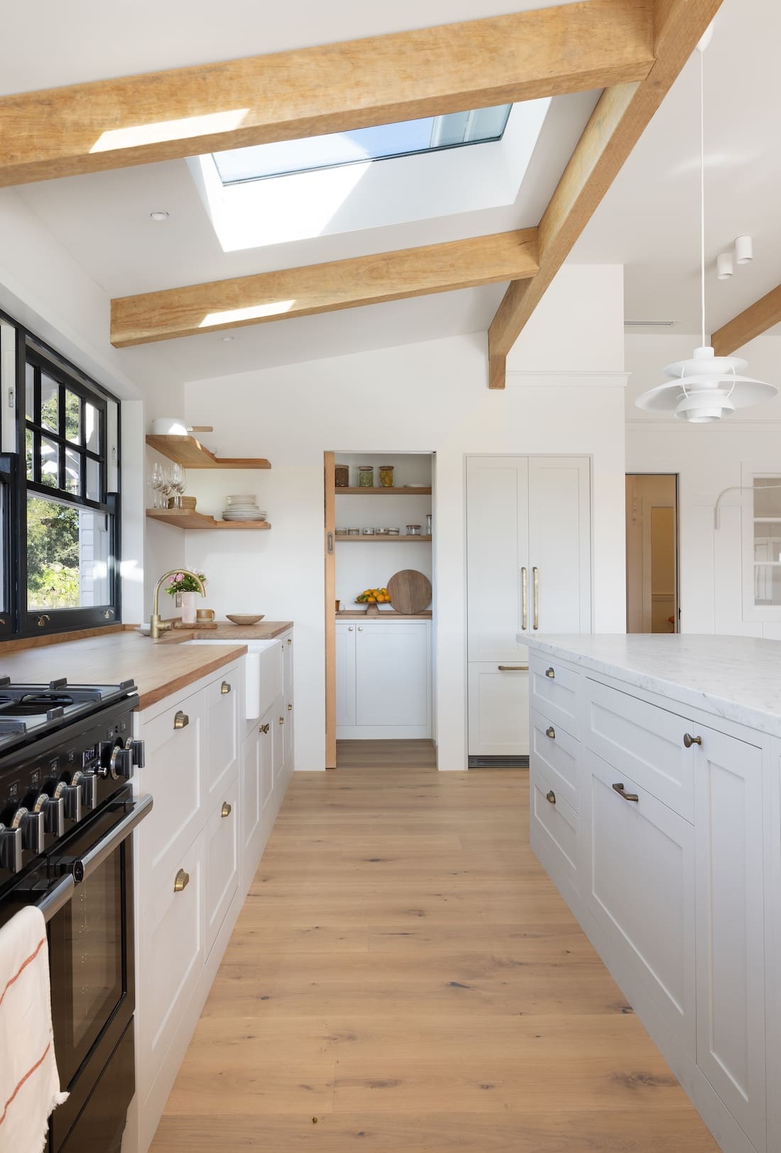 Galley kitchen with timber beams in Rocklee House