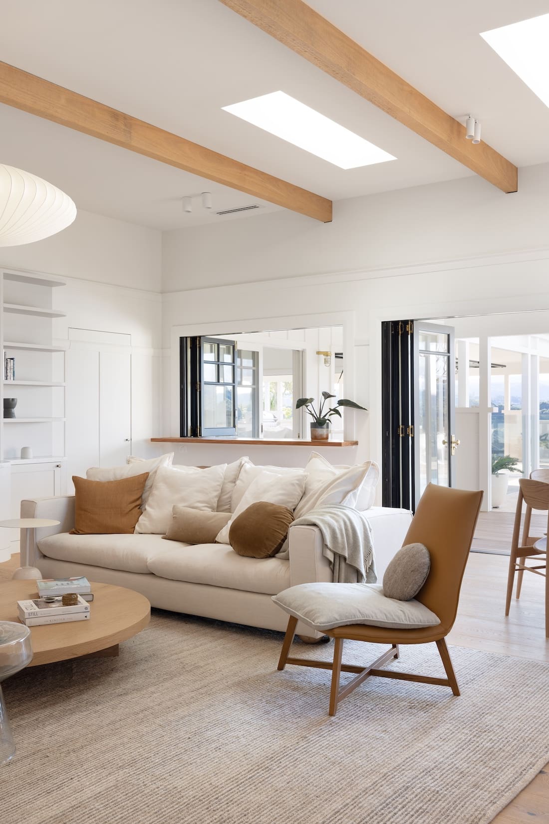 Living room with white and cream colour palette at Rocklee House