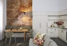Five easy ways to create more space when entertaining at home Exposed brick dining nook opening into living and kitchen in Tribeca Brewery apartment by The Stylesmiths