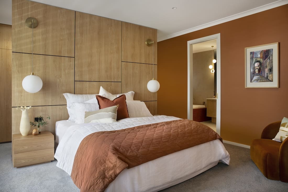 Master bedroom in Warm Embrace residence by The Stylesmiths
