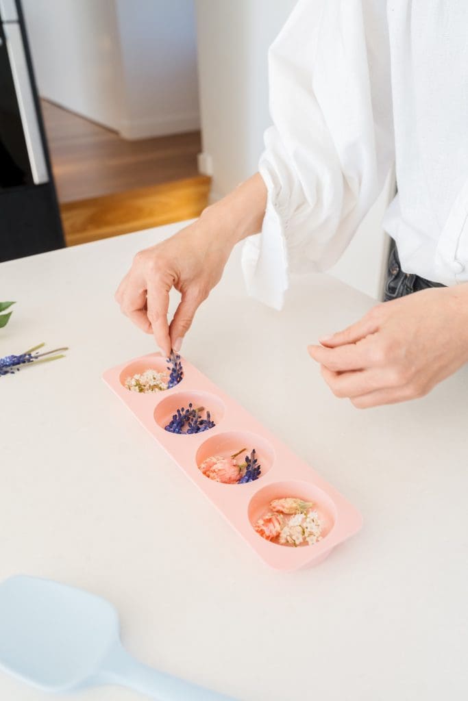 Place flowers in moulds