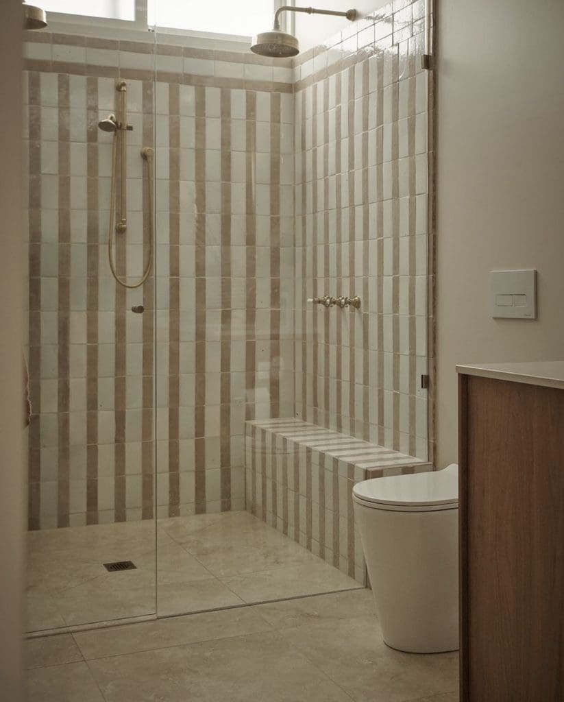 Striped tile shower and bench seat