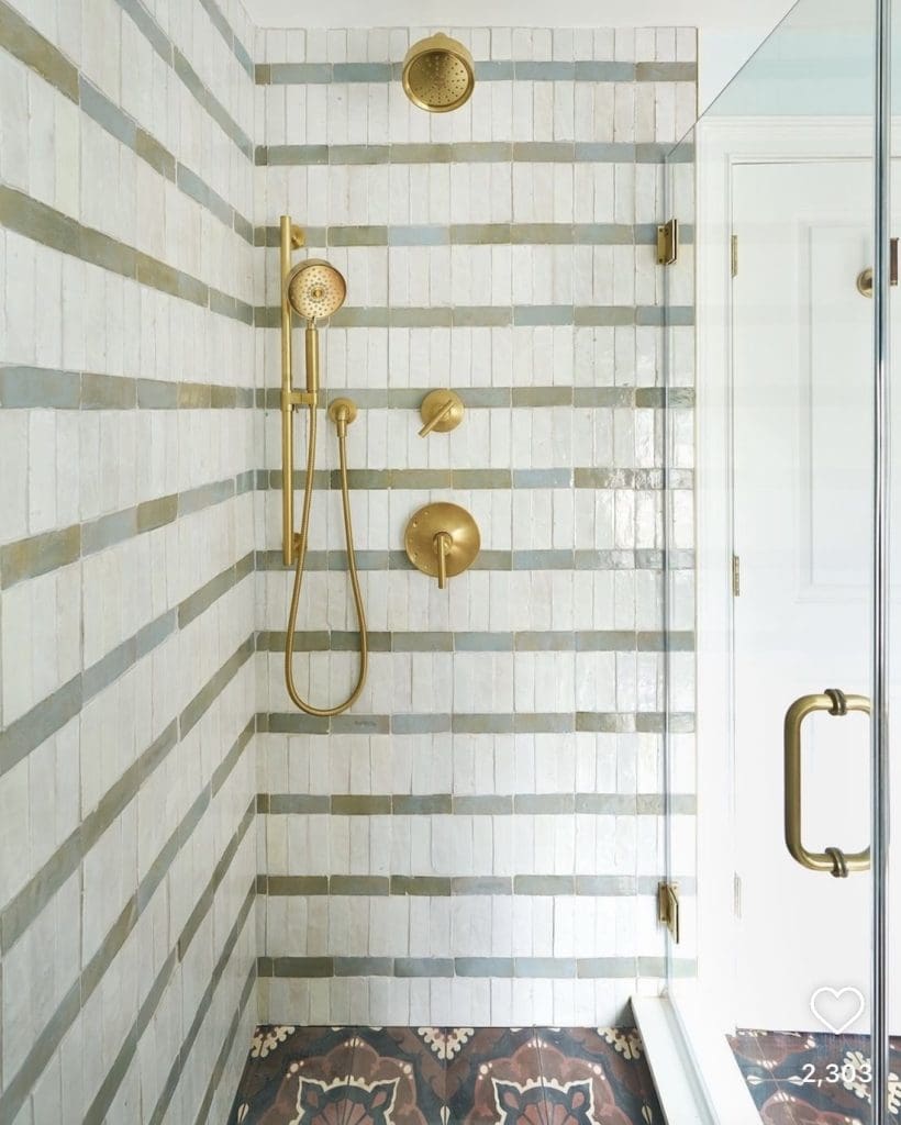 Stripe shower with patterned floor tile