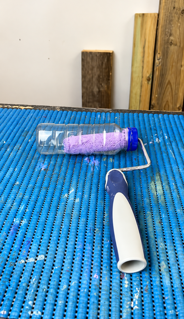 DIY Bottle Paint Roller on Blue Workshop Mat