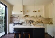 Marble kitchen renovation with black island