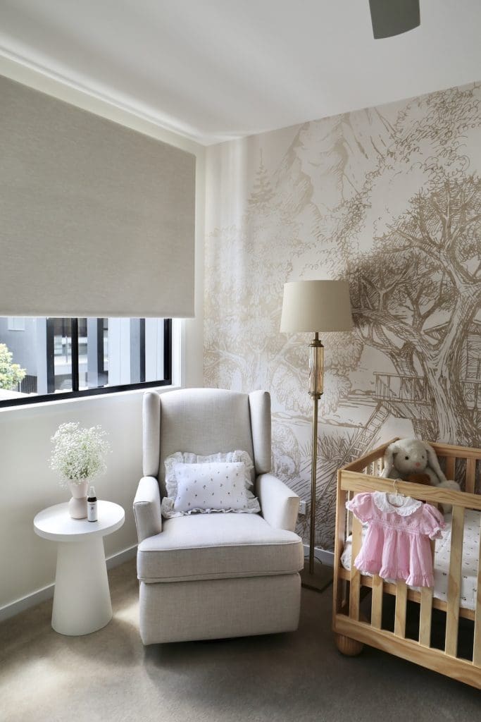 White side table and feeding chair in nursery