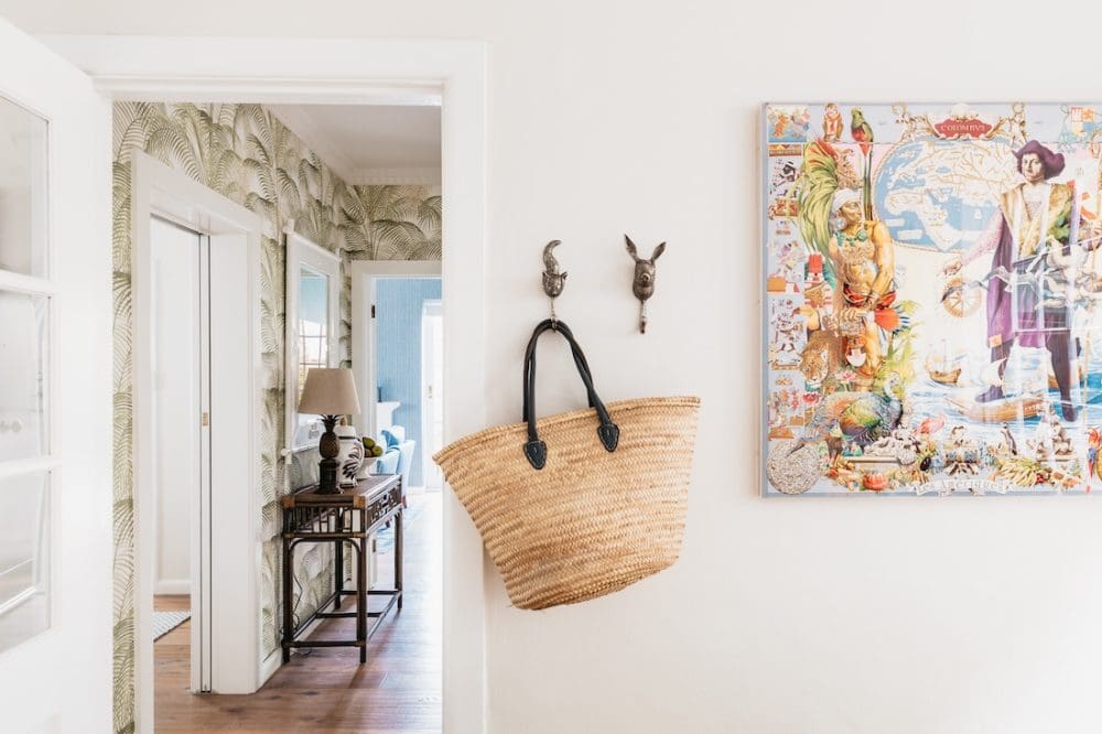 Straw bag on wall hook in hallway at Patterned Sanctuary by The Stylesmiths
