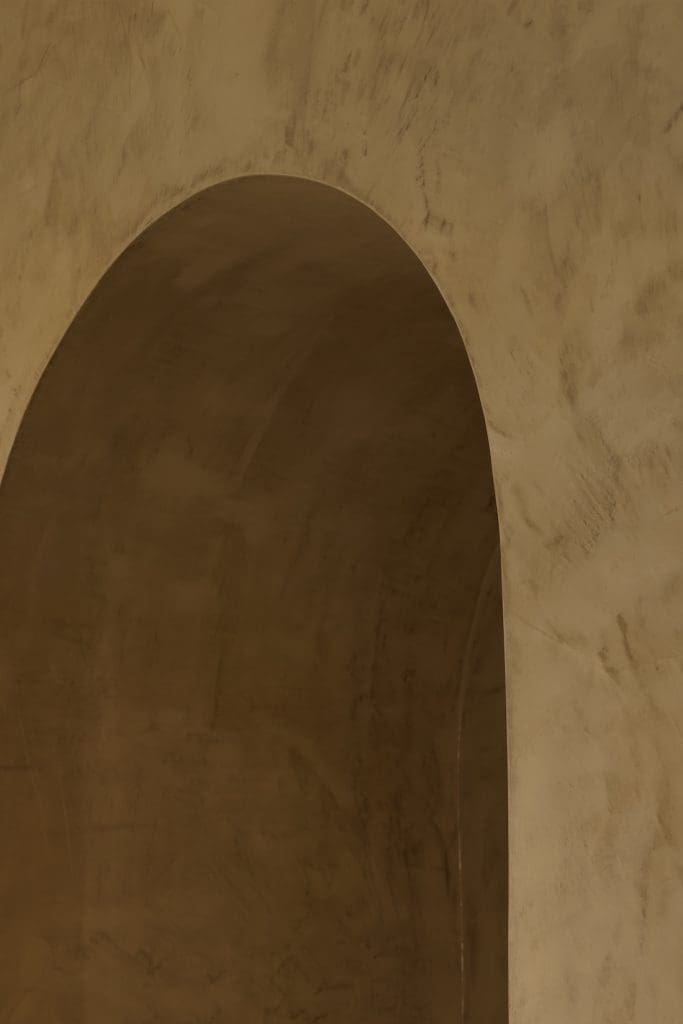 Stone archway in Coastal Alchemy by The Stylesmiths