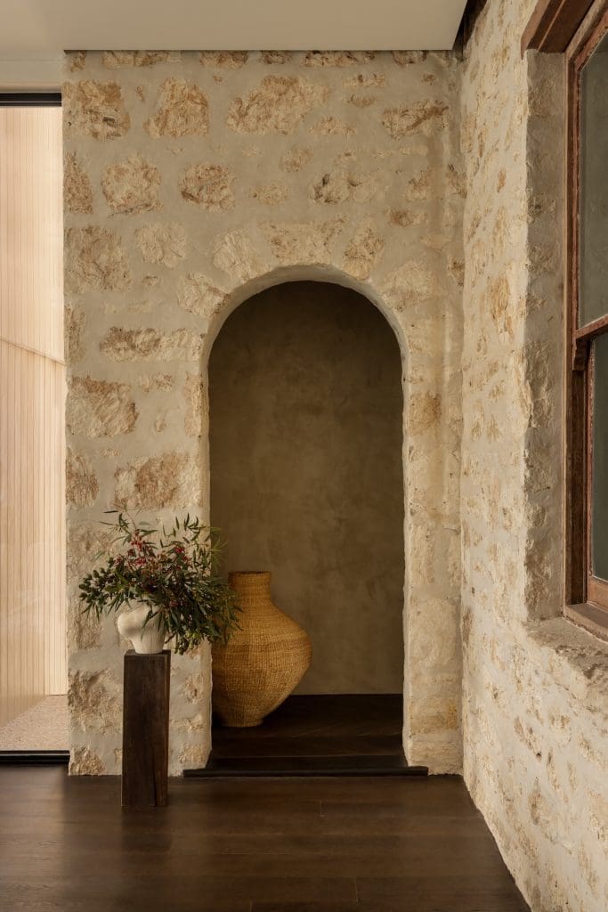 Stone arch doorway at Coastal Alchemy by The Stylesmiths