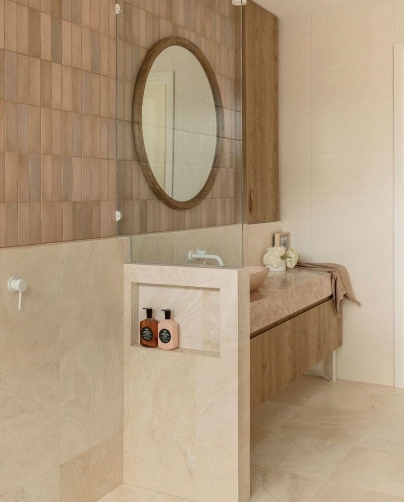 Muted pink subway tile feature in bathroom