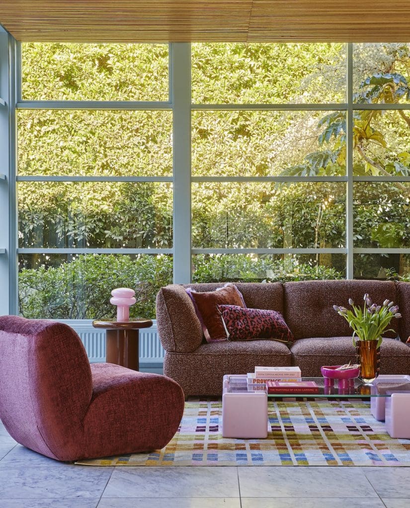 Pale blue walls with pink furniture