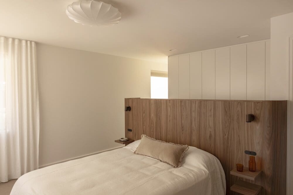 Master bedroom with custom built bedhead in Deakin Home