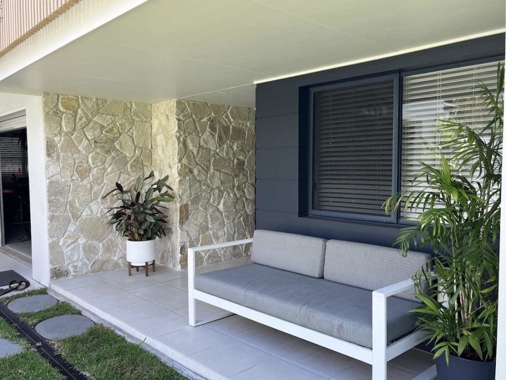 DIY stone wall makeover by Bec Riley from Rileygoodadventures - finished wall styled space