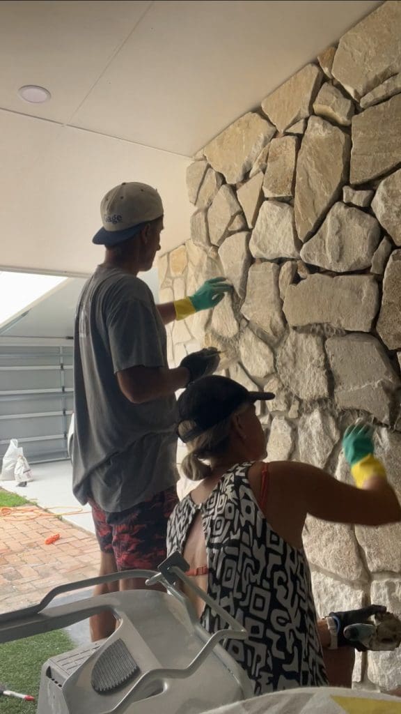 DIY stone wall makeover by Bec Riley from Rileygoodadventures - applying grout