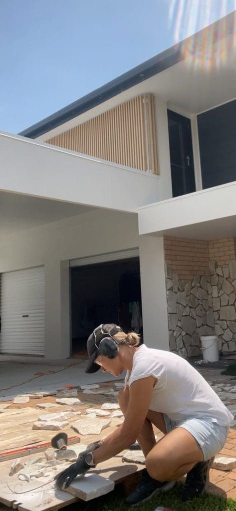 DIY stone wall makeover by Bec Riley from Rileygoodadventures - cutting stone pieces