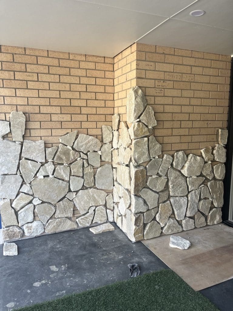 DIY stone wall makeover by Bec Riley from Rileygoodadventures - halfway through the project